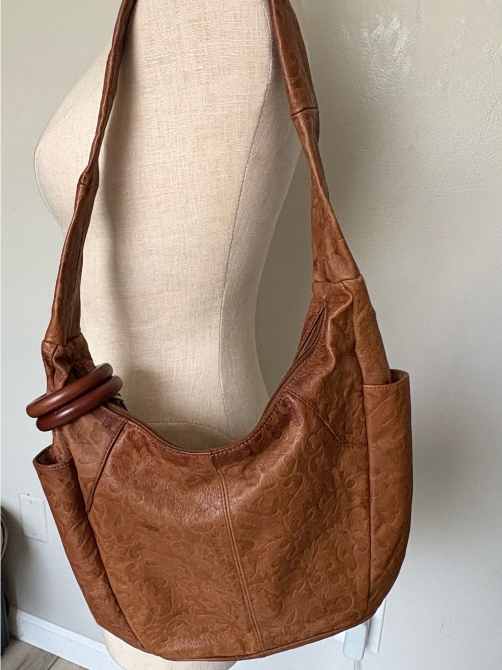 Leather Stylish Embossed Brown Shoulder Bag .